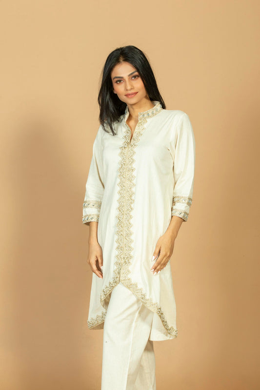 Off-White Solid Kurta Pant Set with Embroidered Detailing